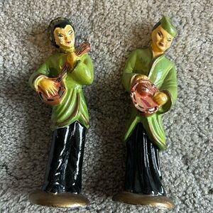 Vintage chalkware figurines. Depicting Asian musicians playing instruments